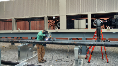 Dimech Plumbing Services cutting pipe for installation